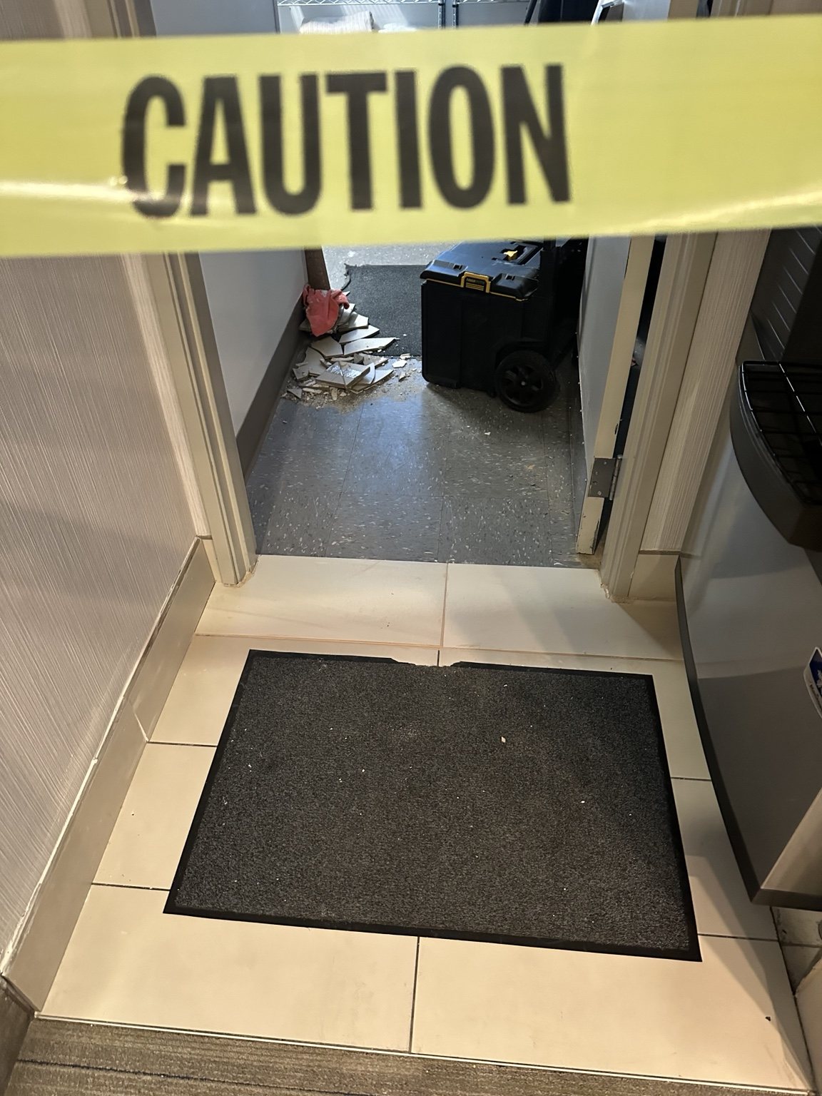 Commercial doorway tile repair after replacement